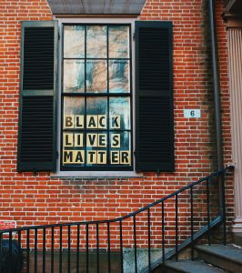 *Black Lives Matter* sign in window