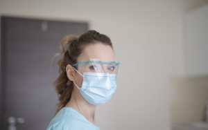 Nurse with surgical mask.